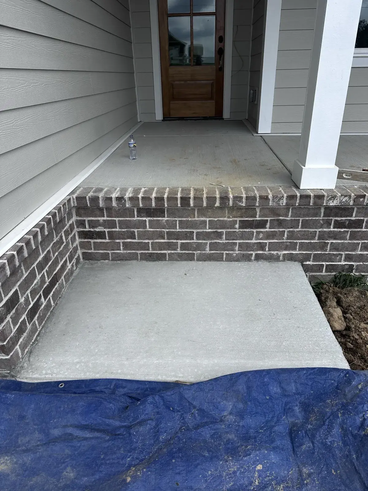 Front porch steps before masonry rebuild